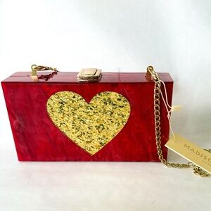 NWT Madison Red Acrylic Clutch with Gold Heart Accent. 7" wide